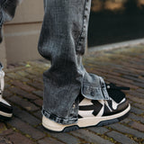 DISTRESSED FLARED JEANS