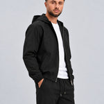 Core Tech Jacket Black - zijkant studio, open gedragen