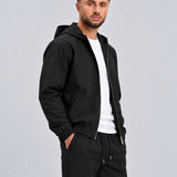 Core Tech Jacket Black - zijkant studio, open gedragen
