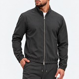 MONZA jacket grijs – vooraanzicht met blik opzij, complete set met bijpassende pants (studio)