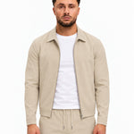 TECH SUIT BEIGE - studio voorkant