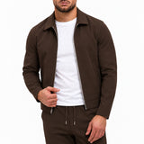 TECH SUIT BROWN - studio pose